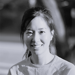 Black and white square portrait of Janet Kim.