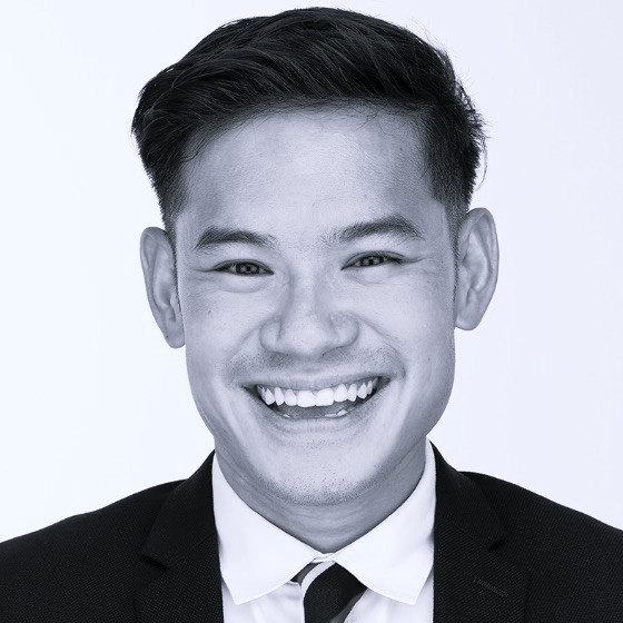 Black and white square portrait of Justin Bui