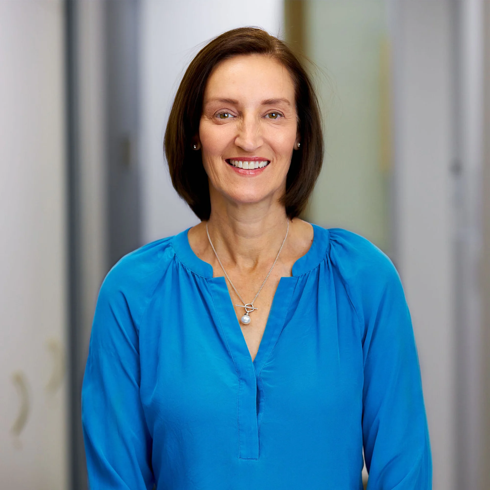Black and white square portrait of Genevieve Sadler